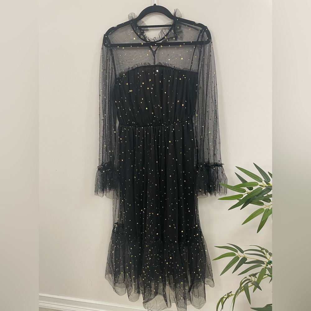 Sheer gown with star and moon details